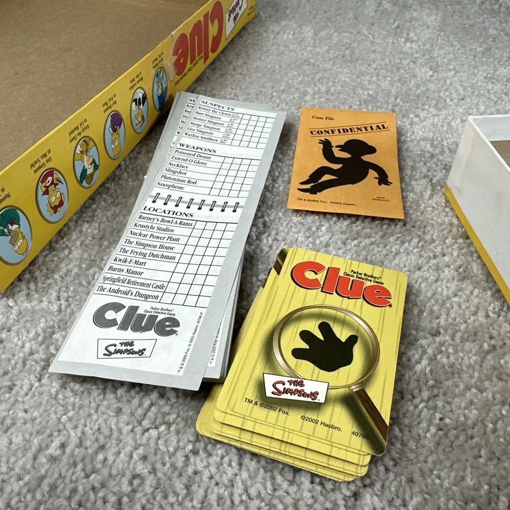 The Simpsons CLUE Parker Brothers Classic Detective Board Game 2002